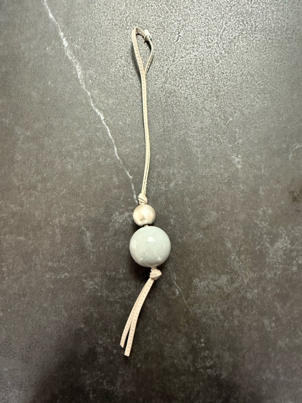 COS bag charm